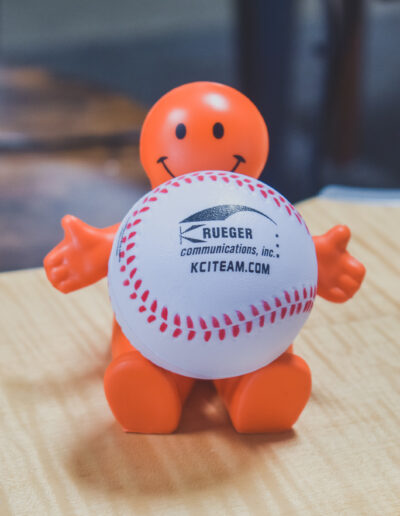 krueger communication baseball logo